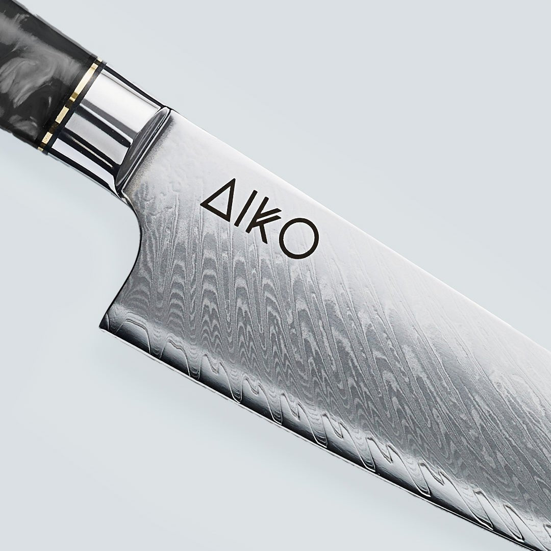 سكين أيكو أسود (あいこ، アイコ) من الفولاذ الدمشقي بمقبض من الراتنج الأسود الملون